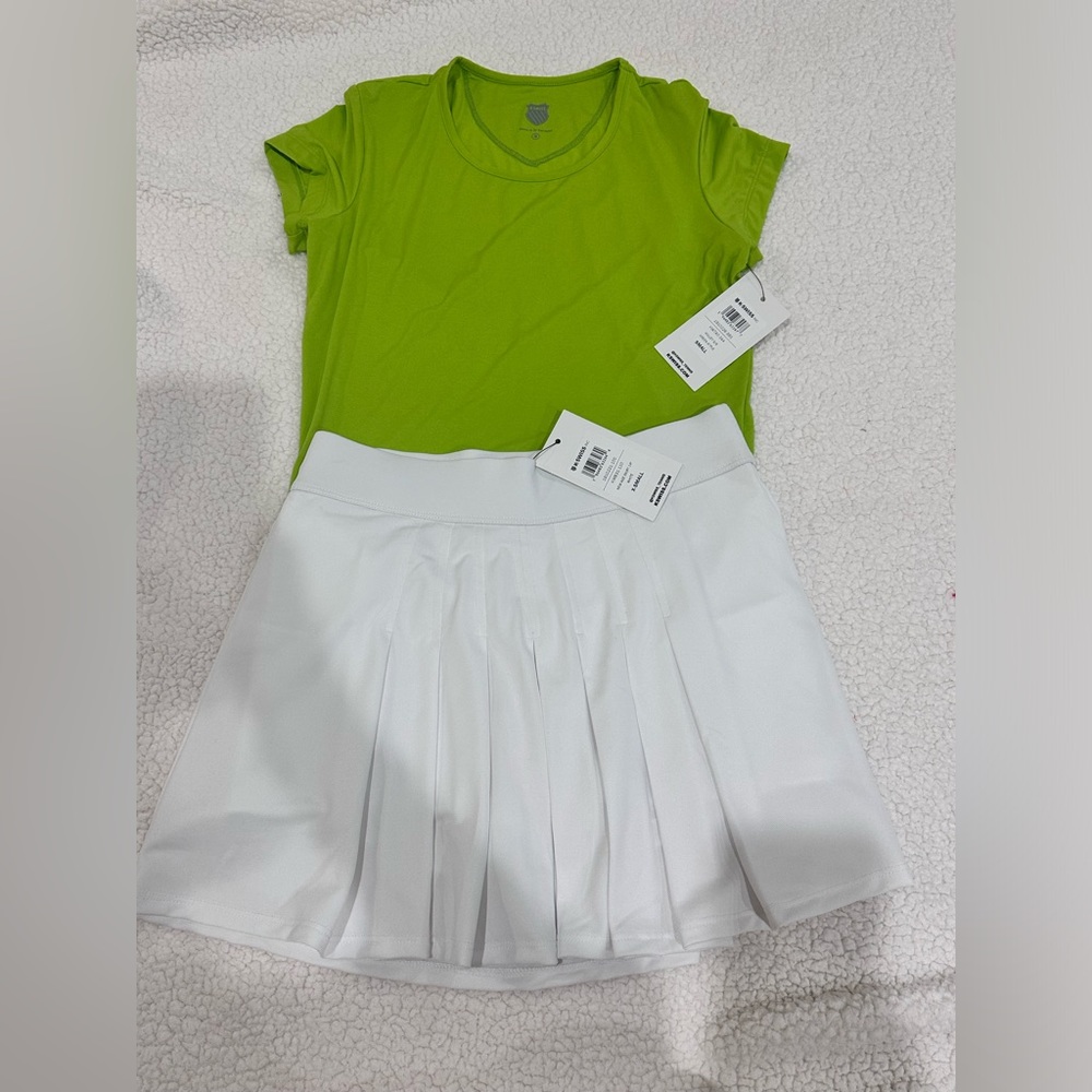 Kswiss white and meteorite new age tennis skirt with volley short sleeve top.